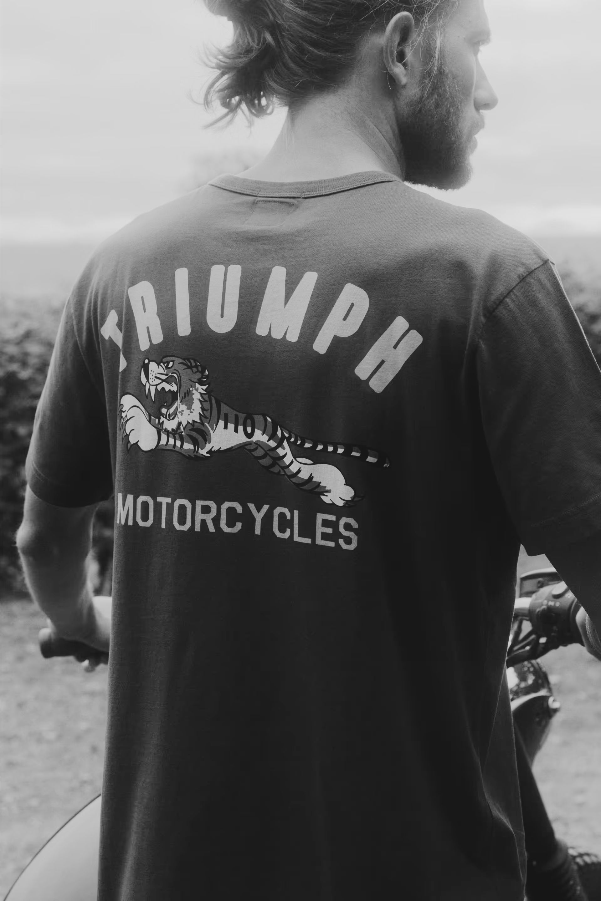 Man wearing Super Sport Graphic Tee